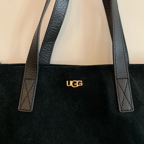 UGG Handbags - Ugg black purse with fur trim.